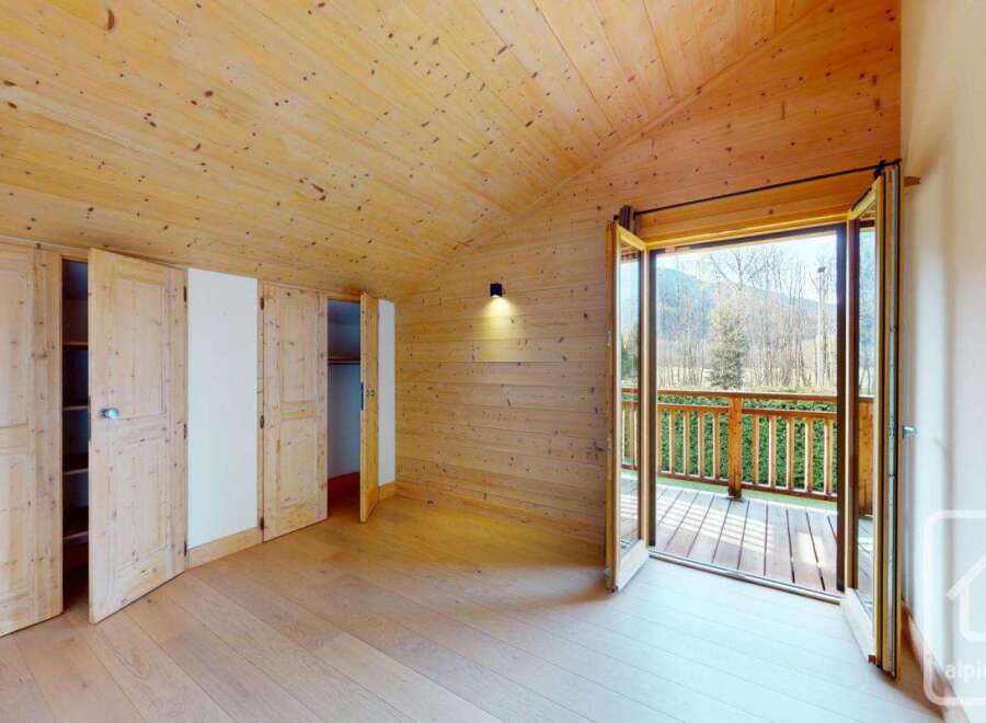 Discover the charm of this stunning property, featuring a beautifully designed interior with wooden accents throughout.