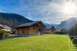 Discover your dream chalet in the heart of the Alps! This stunning property boasts a beautiful wooden exterior, offering a warm and inviting atmosphere.