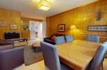 This charming property boasts a warm and inviting living space, perfect for relaxing or entertaining.