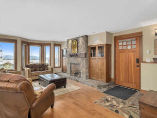 This stunning living room features a cozy fireplace, perfect for those chilly evenings.