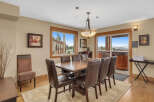 This stunning dining area offers a perfect blend of elegance and comfort.