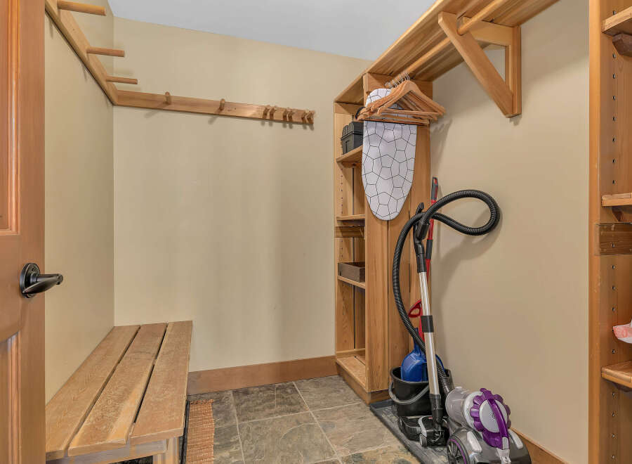 Discover the perfect blend of functionality and style in this well-organized utility room.