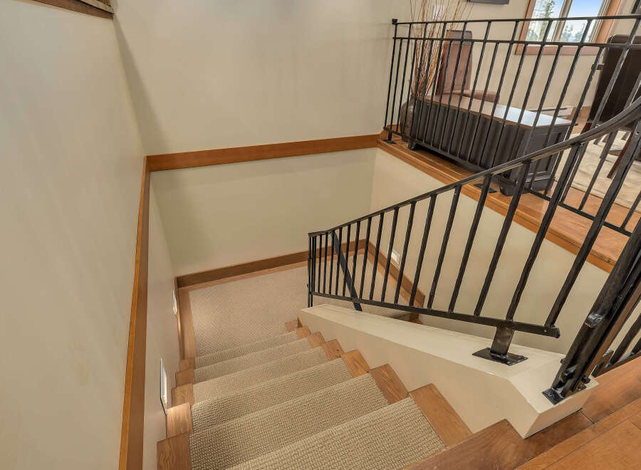 This stunning property boasts a beautifully designed staircase, perfect for making a grand entrance.