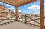 Enjoy breathtaking views from this stunning balcony overlooking a picturesque mountain landscape.