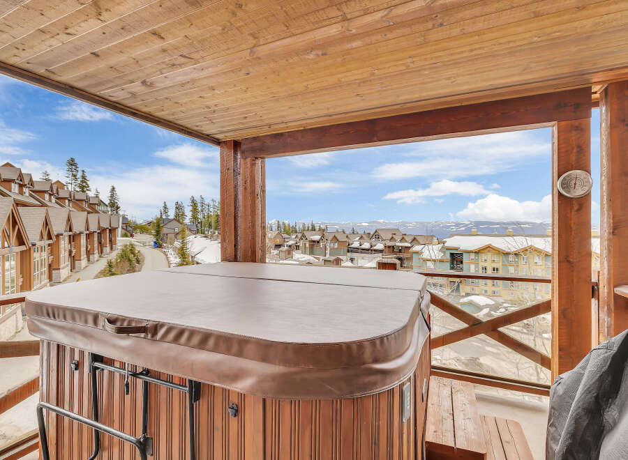 Enjoy breathtaking mountain views from this luxurious property featuring a private hot tub.