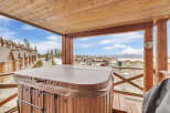 Enjoy breathtaking mountain views from this luxurious property featuring a private hot tub.