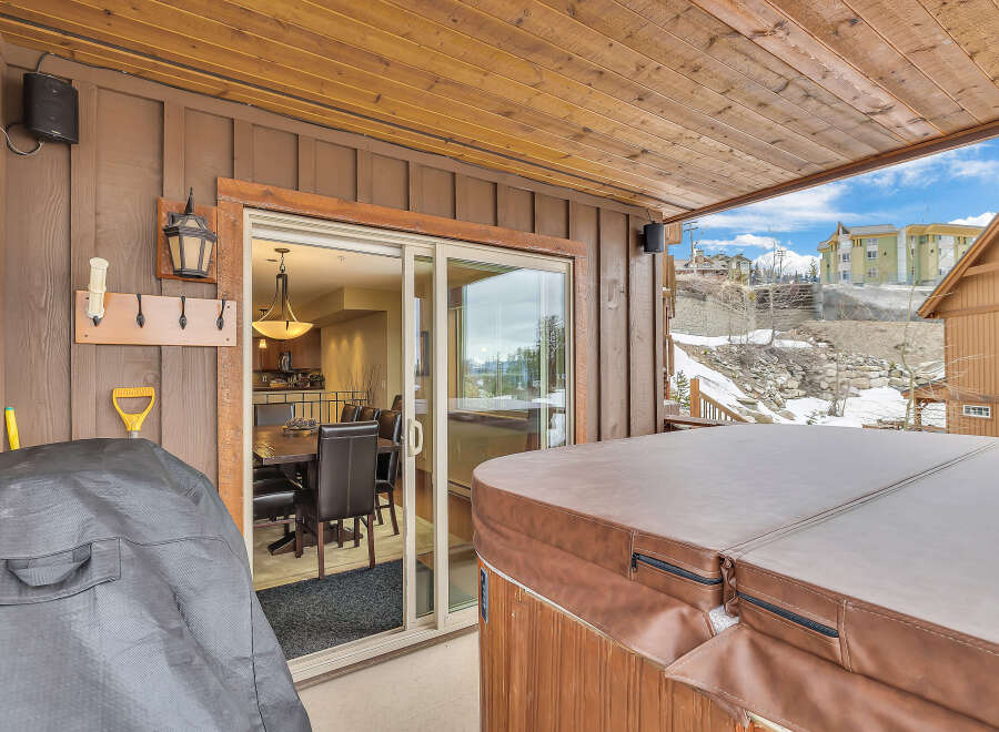 Enjoy the luxury of this stunning property, featuring a private hot tub perfect for relaxation.