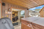 Enjoy the luxury of this stunning property, featuring a private hot tub perfect for relaxation.