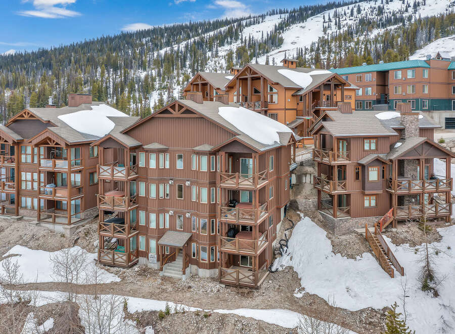 Nestled in a picturesque mountain setting, this stunning property offers luxurious living with breathtaking views.