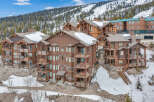 Nestled in a picturesque mountain setting, this stunning property offers luxurious living with breathtaking views.