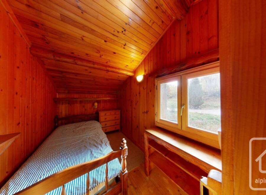 Discover the charm of this cozy wooden cabin, perfect for a relaxing getaway.