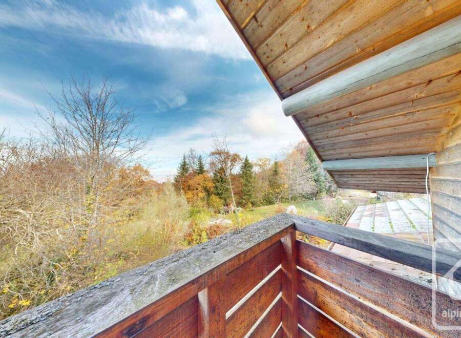 Enjoy breathtaking views from this charming balcony.