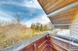 Enjoy breathtaking views from this charming balcony.