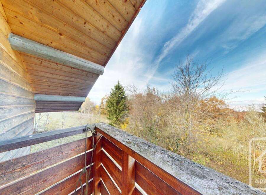 Enjoy breathtaking views from this charming balcony.