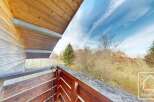 Enjoy breathtaking views from this charming balcony.