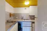 Discover this charming kitchen space, perfect for culinary enthusiasts.