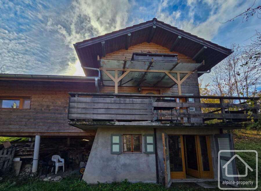 Discover this charming wooden chalet nestled in a serene natural setting.