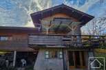 Discover this charming wooden chalet nestled in a serene natural setting.