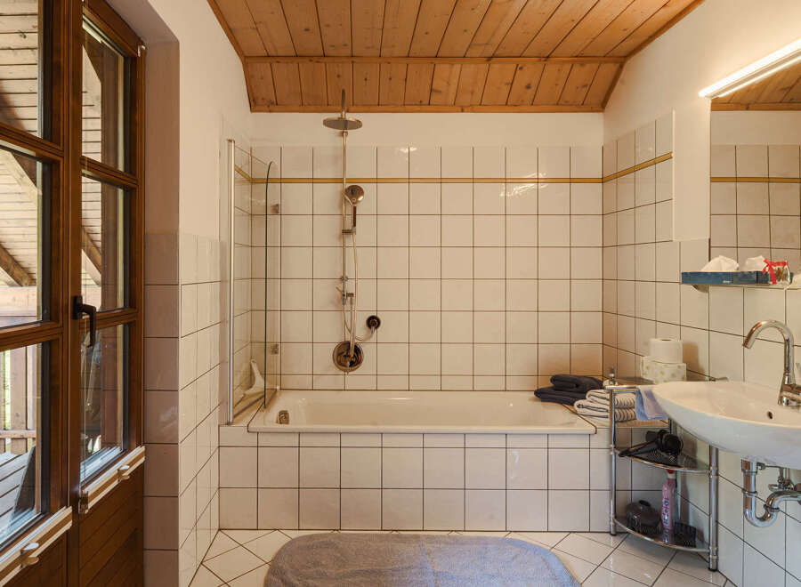 Step into this inviting bathroom, featuring a combination of functionality and style.