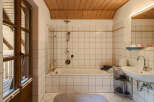 Step into this inviting bathroom, featuring a combination of functionality and style.