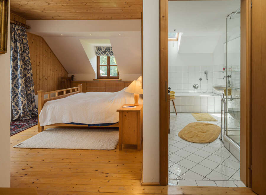 Discover the charm of this inviting bedroom and bathroom combination.