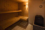 Step into relaxation with this inviting sauna.