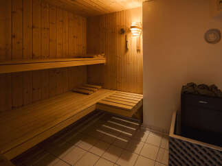 Step into relaxation with this inviting sauna.