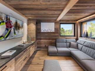 Experience the epitome of alpine luxury in this stunning living space.