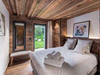 Experience rustic elegance in this stunning bedroom.