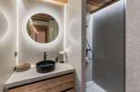 Experience luxury in this modern bathroom design.