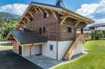 This stunning wooden chalet offers a perfect blend of rustic charm and modern comfort.