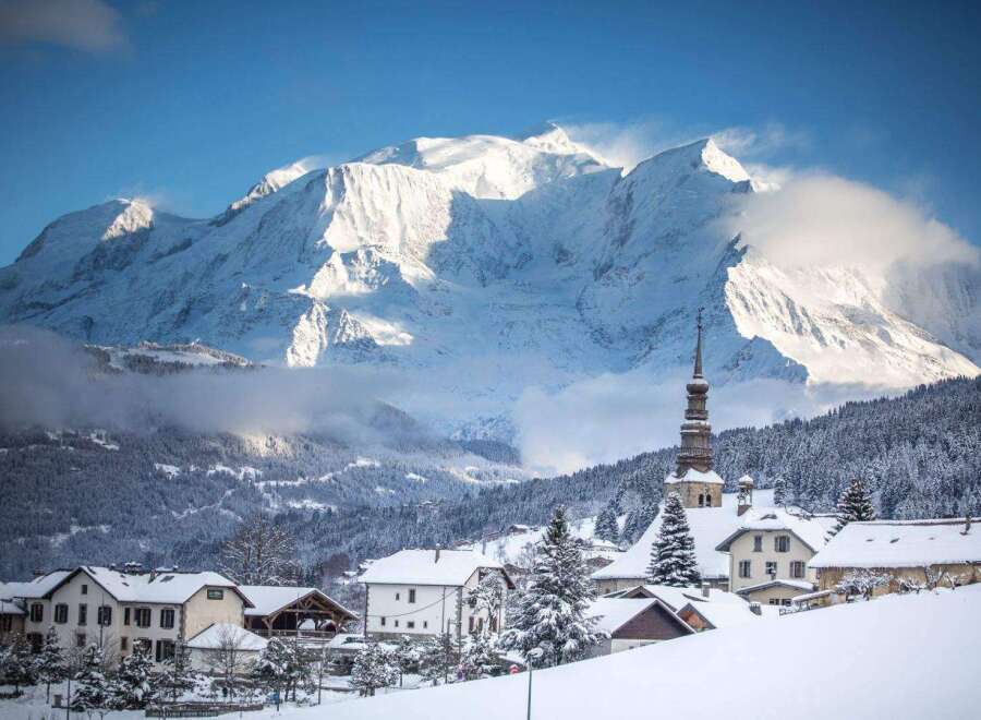 Nestled in a picturesque winter wonderland, this property offers stunning views of snow-capped mountains and a charming village.