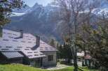 Nestled amidst the breathtaking backdrop of snow-capped mountains, this charming property offers a serene escape.