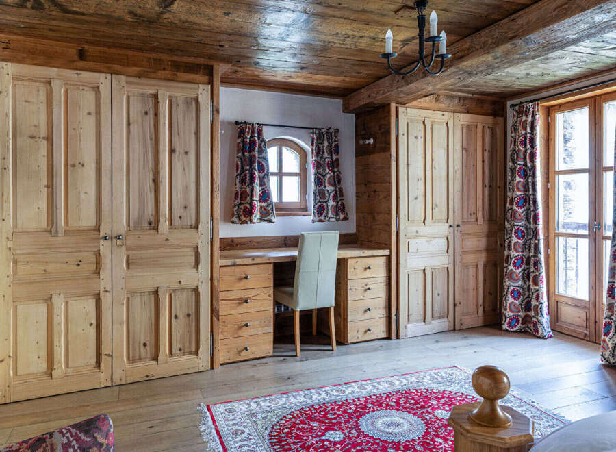 This charming room features a rustic wooden design, perfect for a cozy retreat.