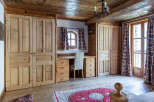 This charming room features a rustic wooden design, perfect for a cozy retreat.