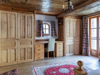 This charming room features a rustic wooden design, perfect for a cozy retreat.