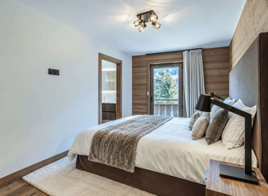 Experience luxury mountain living in this beautifully appointed bedroom.