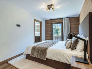 Experience luxury mountain living in this beautifully appointed bedroom.