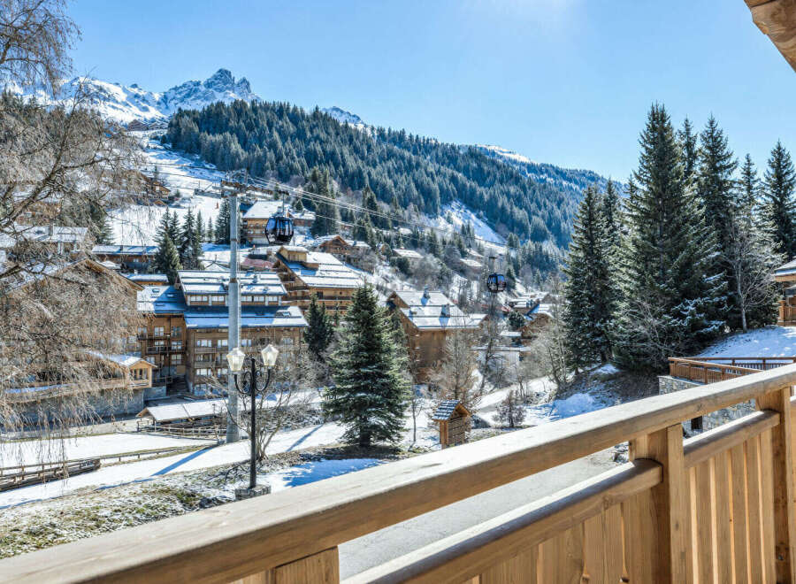 Experience the ultimate alpine lifestyle from this stunning property, offering breathtaking mountain views and direct access to ski slopes.