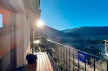 Enjoy breathtaking mountain views from this stunning balcony.