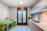 This stunning kitchen boasts breathtaking mountain views, perfect for those who appreciate natural beauty.