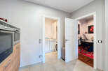 Discover this beautifully designed property featuring a modern kitchen with sleek appliances and ample storage.