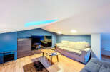Discover this stylish living space, perfect for relaxation and entertainment.