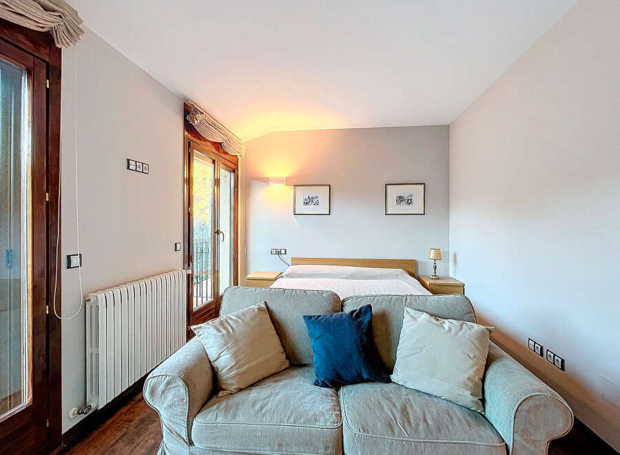 Discover the charm of this inviting bedroom, perfect for relaxation and comfort.
