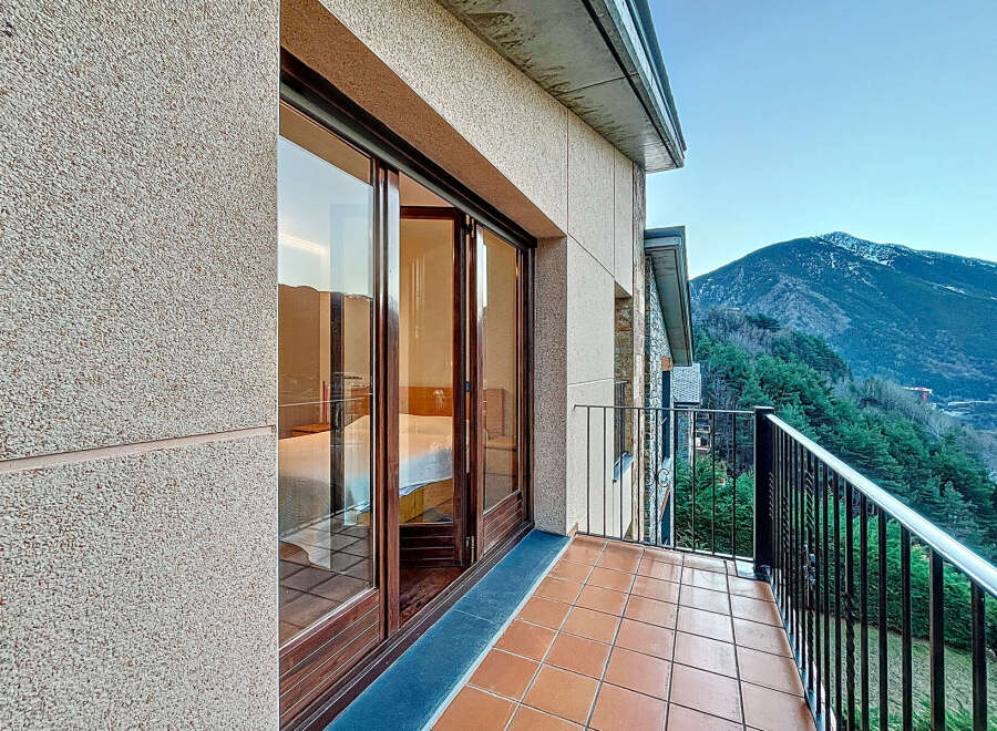 Enjoy breathtaking mountain views from this stunning property.