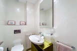 This modern bathroom features a sleek design with a minimalist aesthetic.