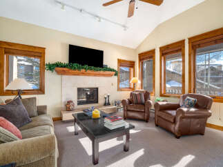 This cozy living room features a fireplace, perfect for those chilly evenings.