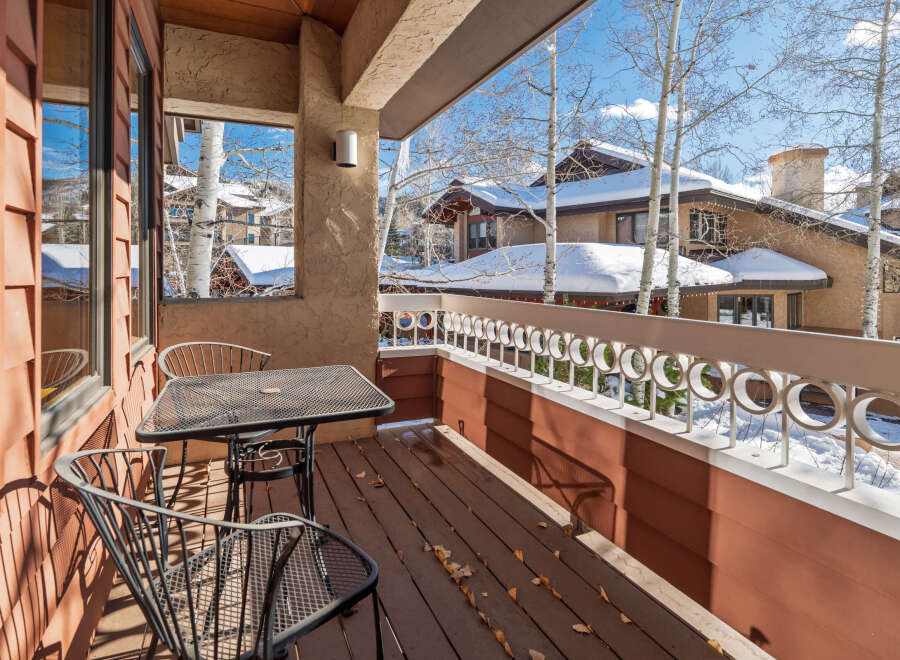 Enjoy breathtaking views from this charming balcony.
