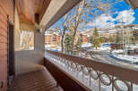 Enjoy breathtaking mountain views from this charming balcony.