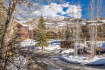 Nestled in a picturesque winter wonderland, this stunning property offers a serene escape.